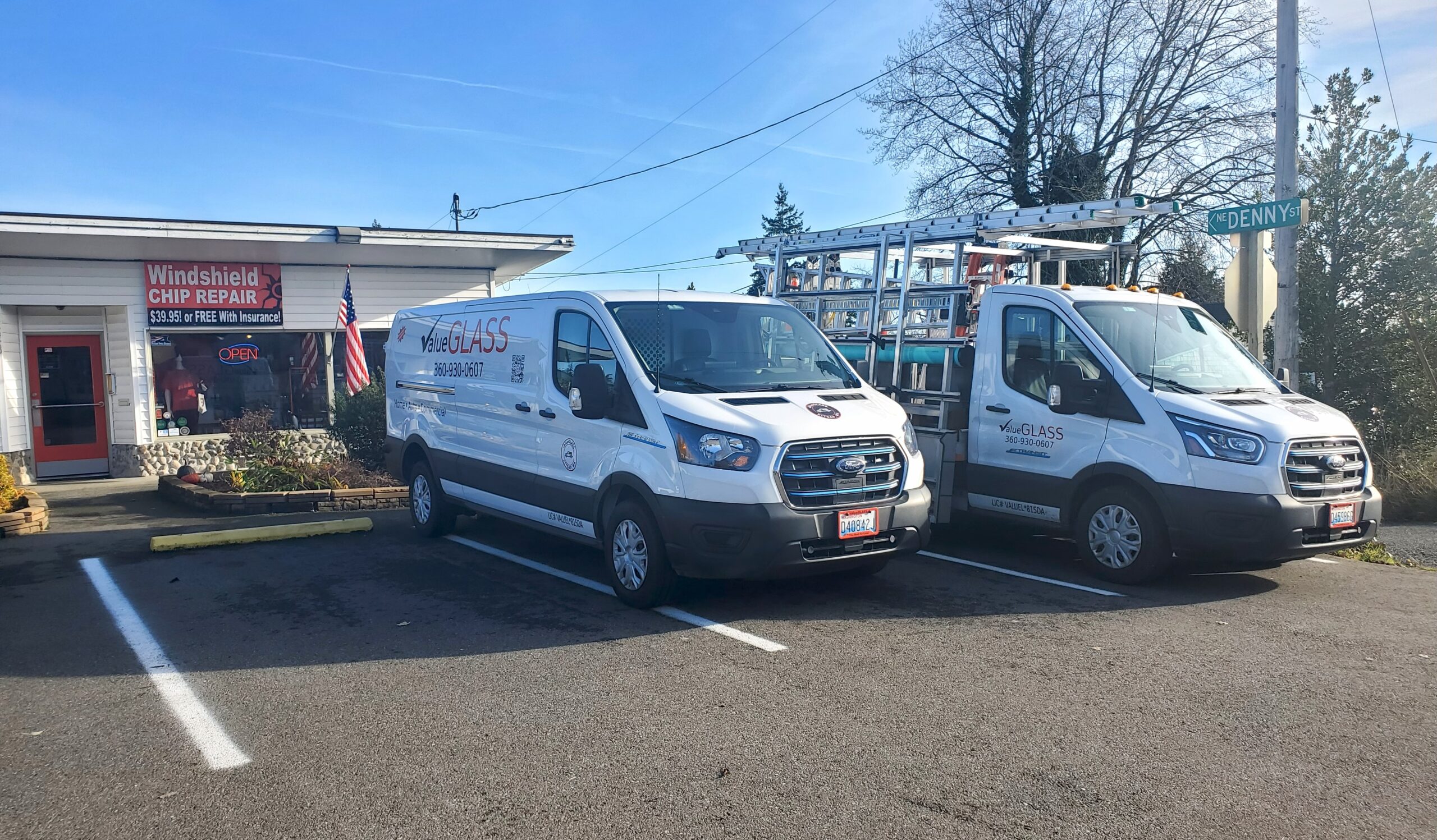 work trucks in front of building